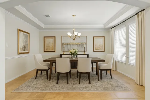 a view of a dining room with furniture