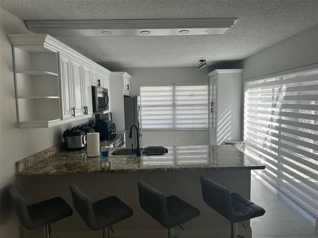 $329,900 | 39 Essex Court, Unit B, Royal Palm Beach, FL 33411