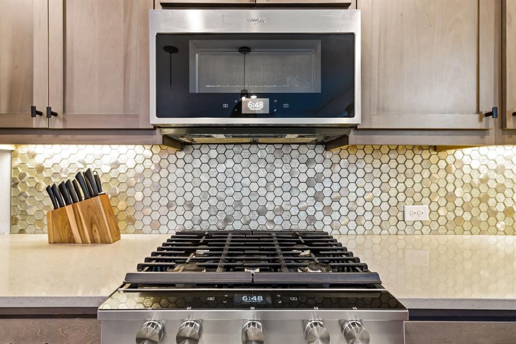 3720 Dutchess Drive Frisco, TX 75034 - Photo 12 of 36 a stove top oven sitting inside of a kitchen