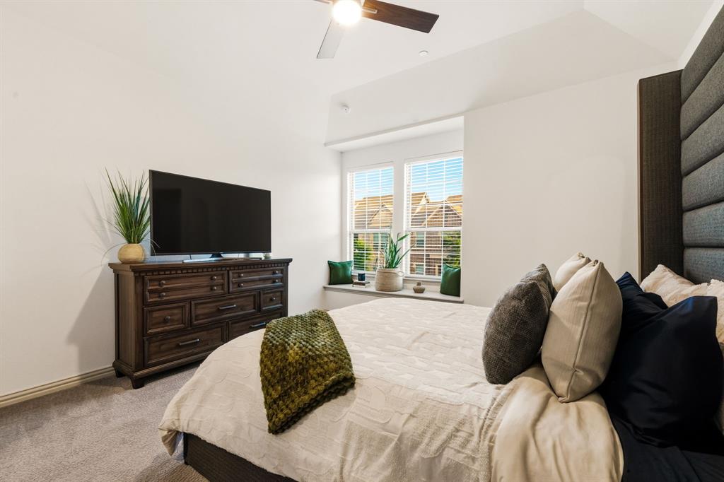 3720 Dutchess Drive Frisco, TX 75034 - Photo 23 of 36 a bedroom with a bed and a flat screen tv