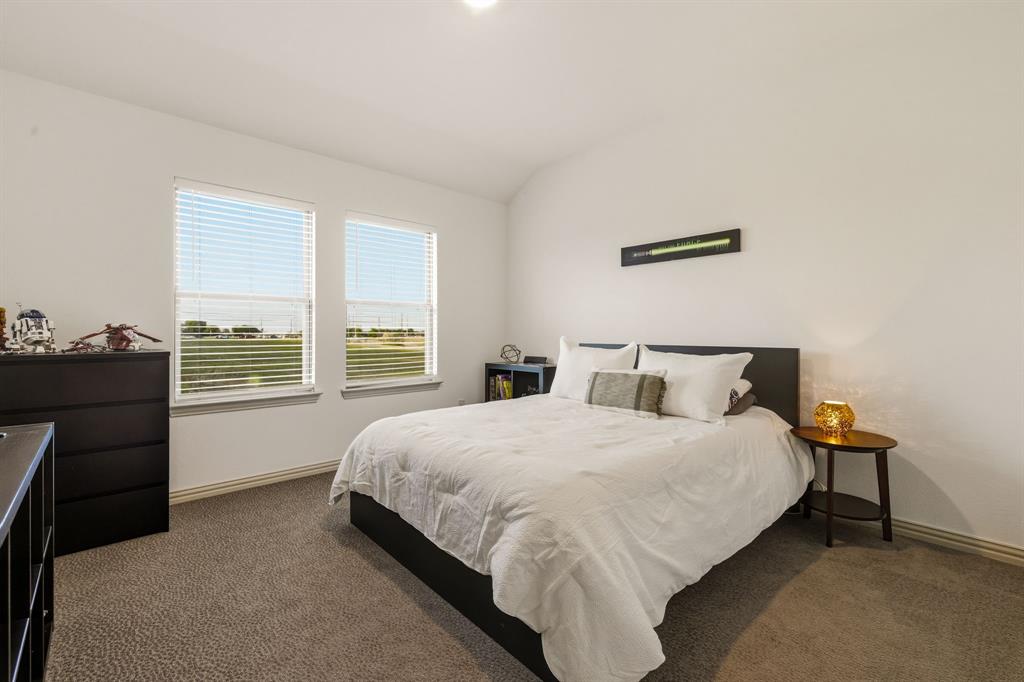 3720 Dutchess Drive Frisco, TX 75034 - Photo 26 of 36 a bedroom with a bed and window