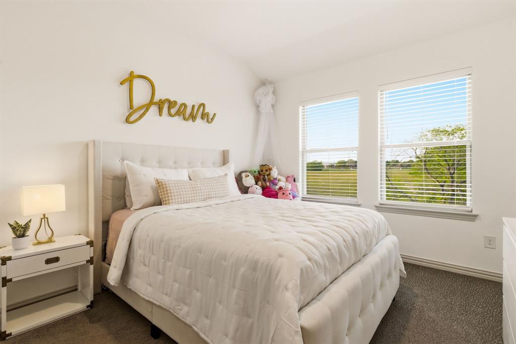 3720 Dutchess Drive Frisco, TX 75034 - Photo 27 of 36 a bedroom with bed and window
