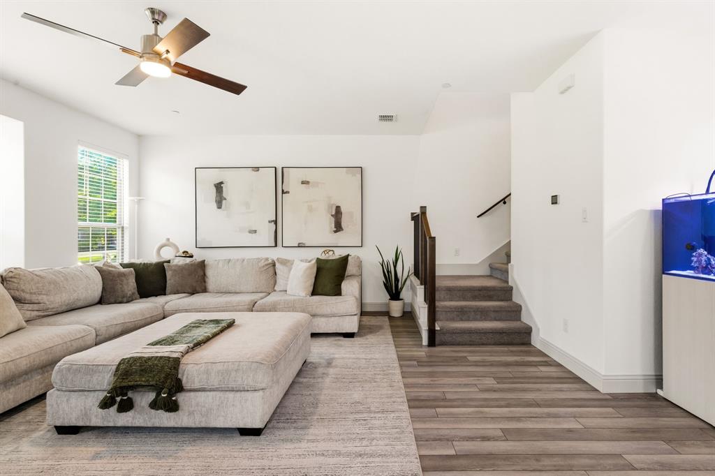 3720 Dutchess Drive Frisco, TX 75034 - Photo 6 of 36 a living room with furniture and wooden floor