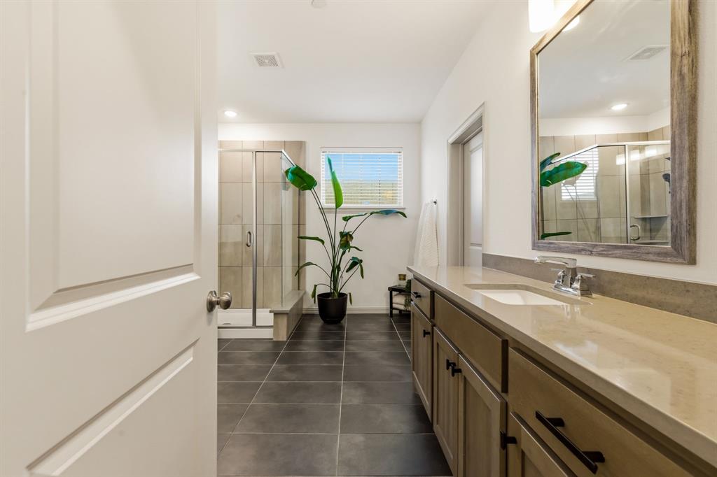 3720 Dutchess Drive Frisco, TX 75034 - Photo 7 of 36 a bathroom with a double vanity sink and mirror