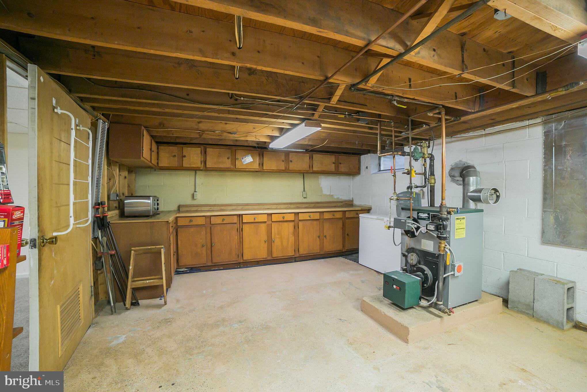 515 Country Club Road Phoenixville, PA 19460 - Photo 25 of 30 Workshop and storage in basement