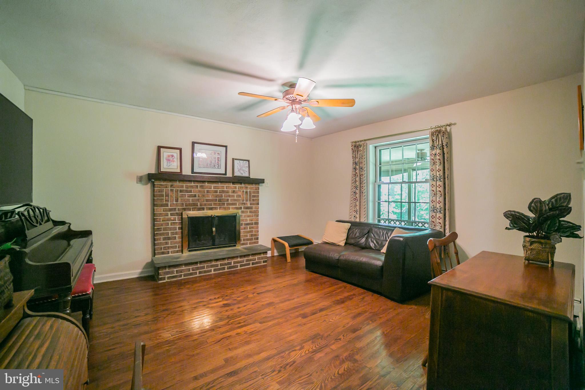 515 Country Club Road Phoenixville, PA 19460 - Photo 8 of 30 Family room with wood burning fireplace