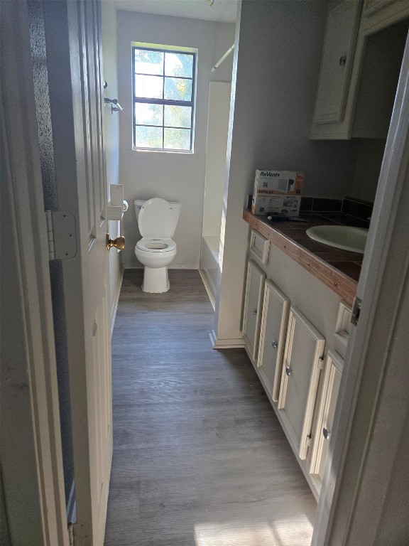 19639 Maple Lane New Caney, TX 77357 - Photo 12 of 18 a bathroom with a sink and toilet