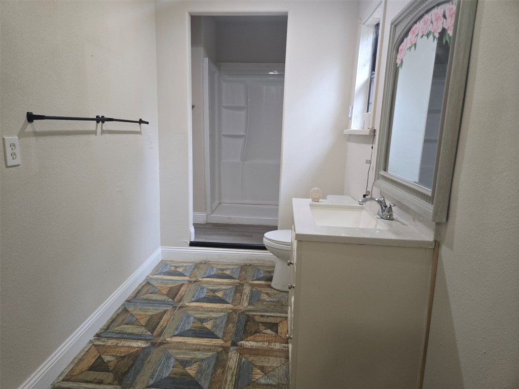 19639 Maple Lane New Caney, TX 77357 - Photo 6 of 18 a bathroom with a sink and a mirror
