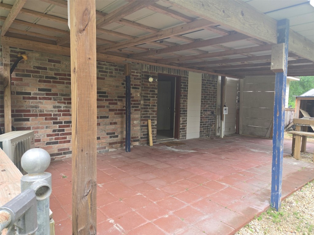 19639 Maple Lane New Caney, TX 77357 - Photo 8 of 18 a view of porch with seating space