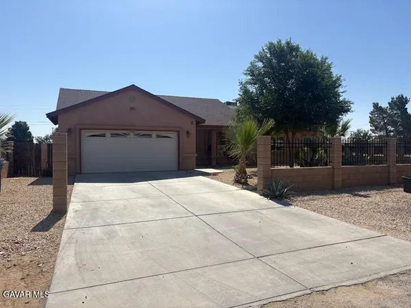 a house view with a outdoor space