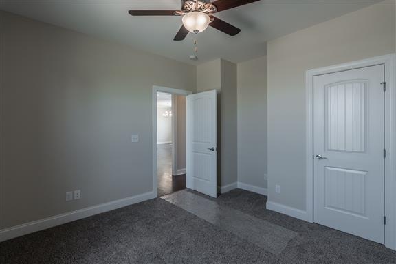 657 Jackson Road Portland, TN 37148 - Photo 18 of 30 a view of an empty room and chandelier fan