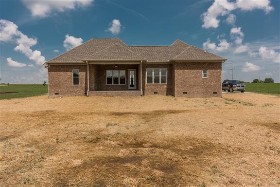 657 Jackson Road Portland, TN 37148 - Photo 2 of 30 a front view of a house with a yard