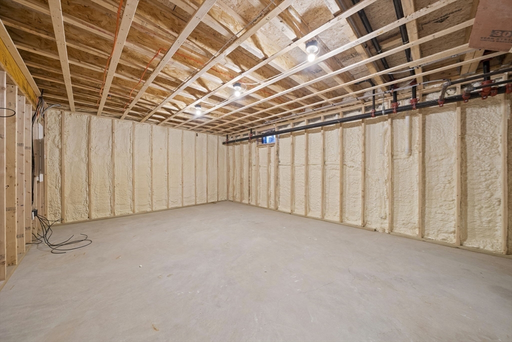 6 Simmonds Boulevard, Unit 6 Randolph, MA 02368 - Photo 22 of 28 a view of a room with wooden walls