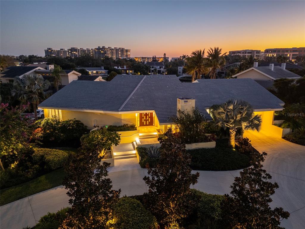 1571 Harbor Cay Lane Longboat Key, FL 34228 - Photo 13 of 93 an aerial view of a house with a lake view