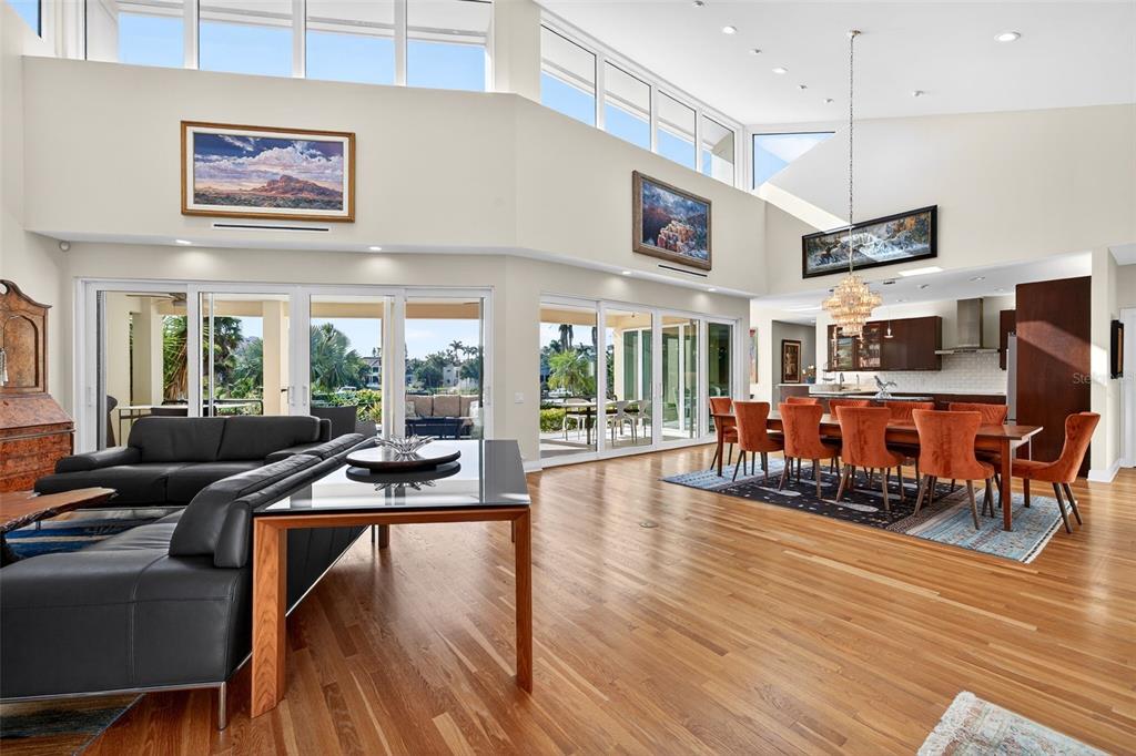 1571 Harbor Cay Lane Longboat Key, FL 34228 - Photo 17 of 93 a living room with fireplace furniture and a flat screen tv