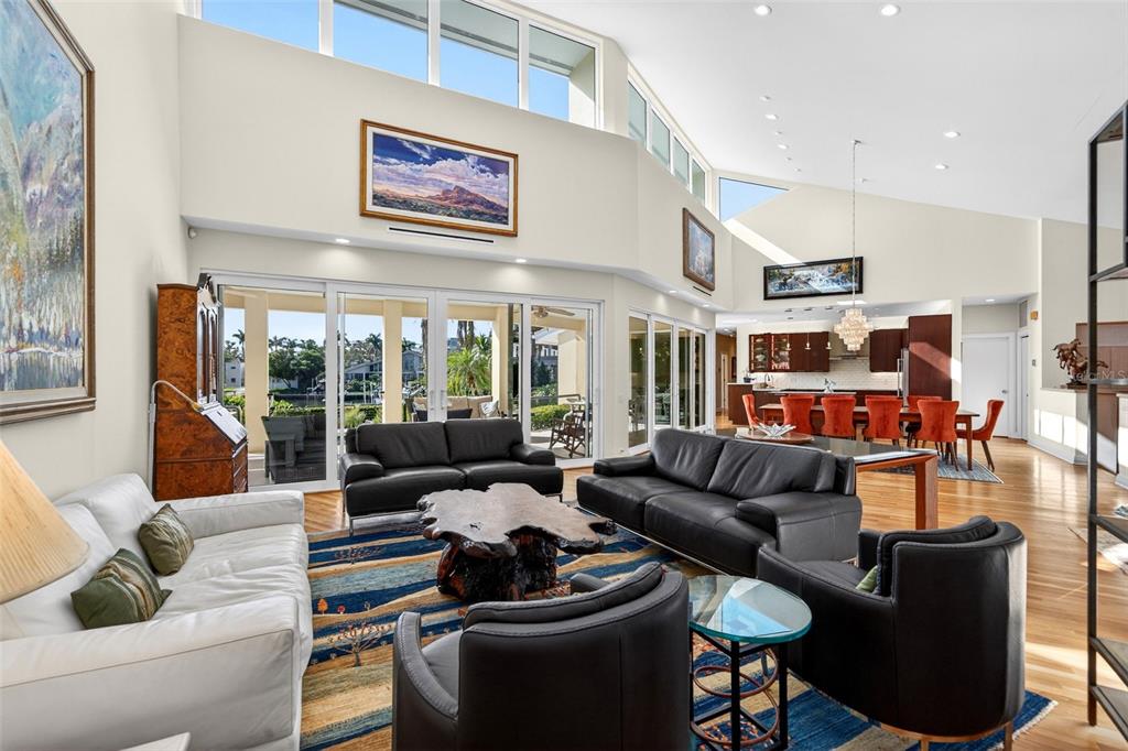 1571 Harbor Cay Lane Longboat Key, FL 34228 - Photo 19 of 93 a living room with furniture and a large window