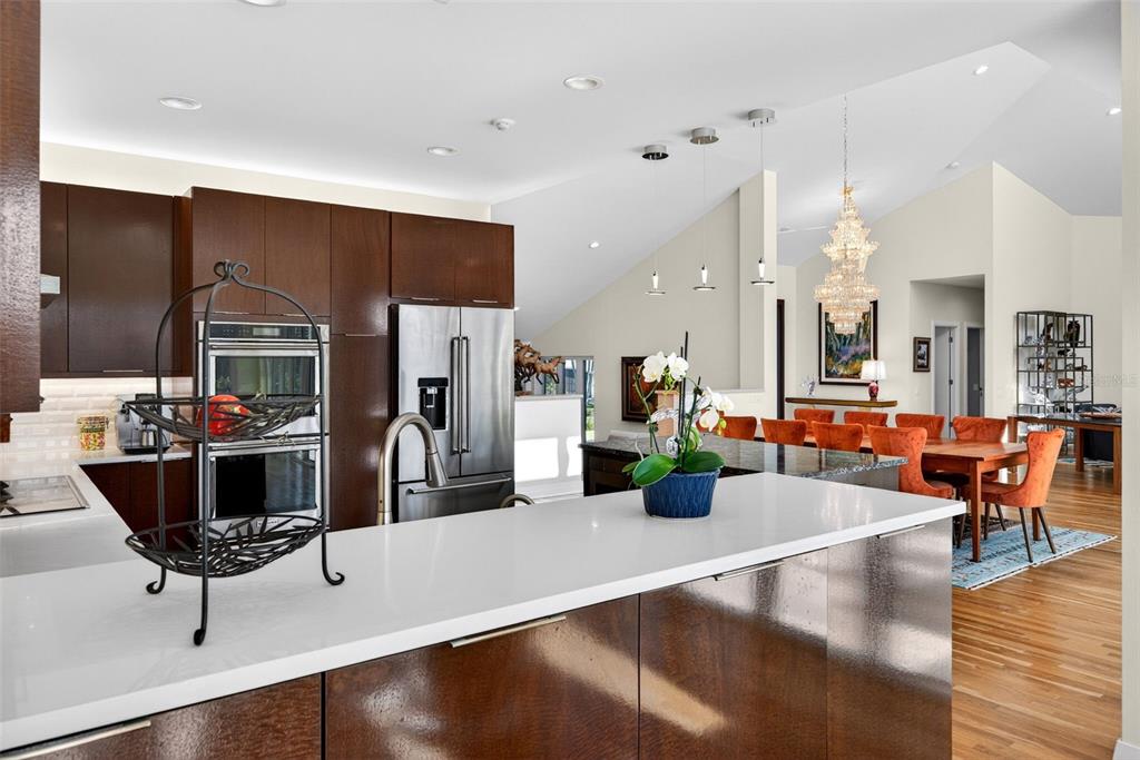 1571 Harbor Cay Lane Longboat Key, FL 34228 - Photo 29 of 93 a room with lots of chairs and view of living room