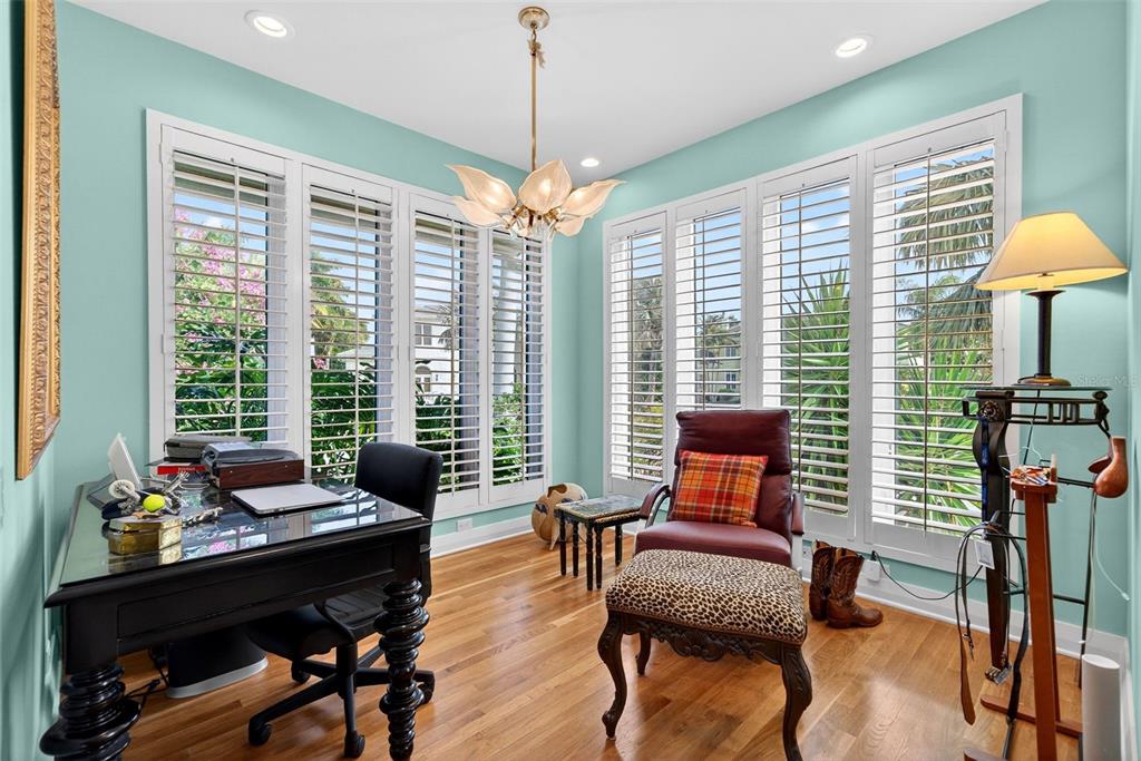 1571 Harbor Cay Lane Longboat Key, FL 34228 - Photo 38 of 93 a living room with furniture and a window