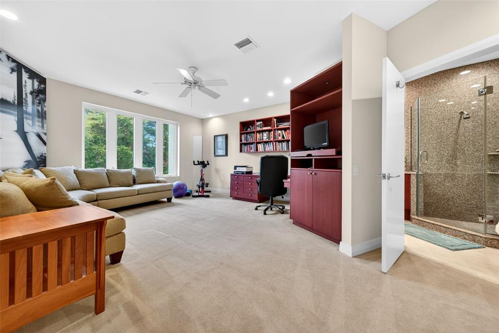 1571 Harbor Cay Lane Longboat Key, FL 34228 - Photo 48 of 93 a living room with furniture and a fireplace