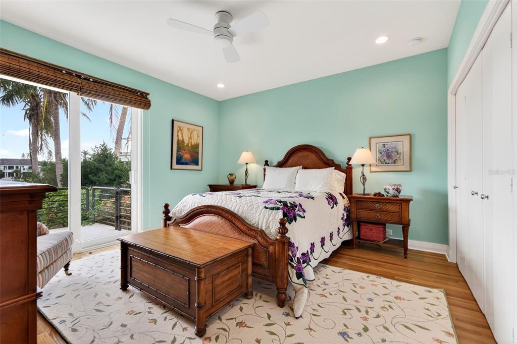 1571 Harbor Cay Lane Longboat Key, FL 34228 - Photo 55 of 93 a bed room with a bed and a couch