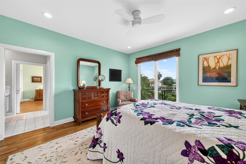 1571 Harbor Cay Lane Longboat Key, FL 34228 - Photo 56 of 93 a bed room with a bed and dresser