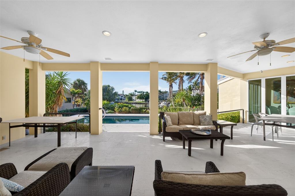 1571 Harbor Cay Lane Longboat Key, FL 34228 - Photo 66 of 93 a living room with furniture and a large window