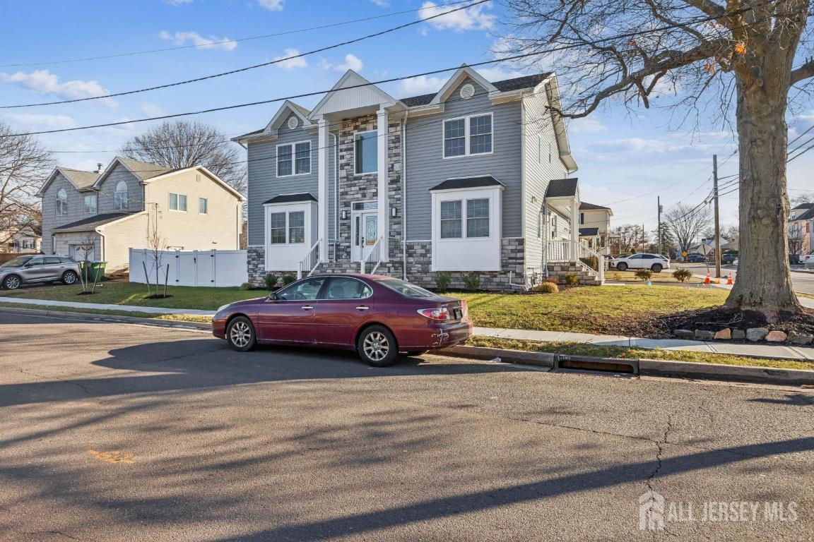 a houses on the side of a street