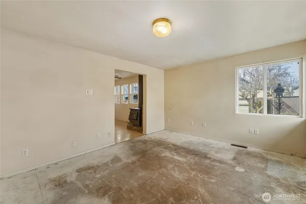 an empty room with windows