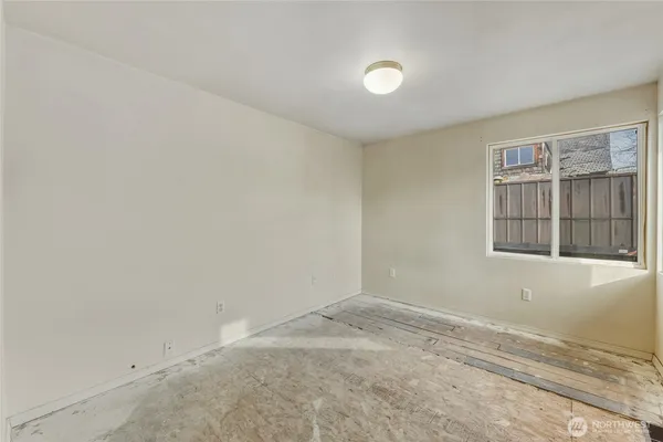 an empty room with windows