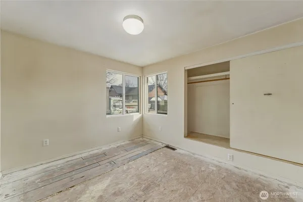 an empty room with windows