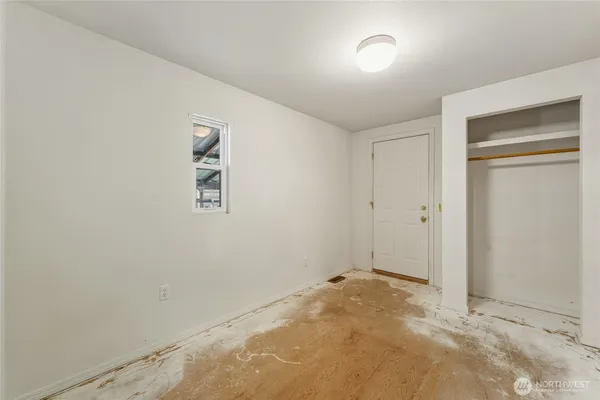an empty room with a workbench