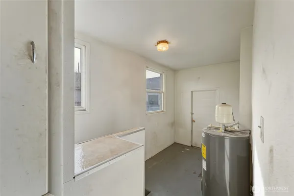 a view of a bathroom with mirror