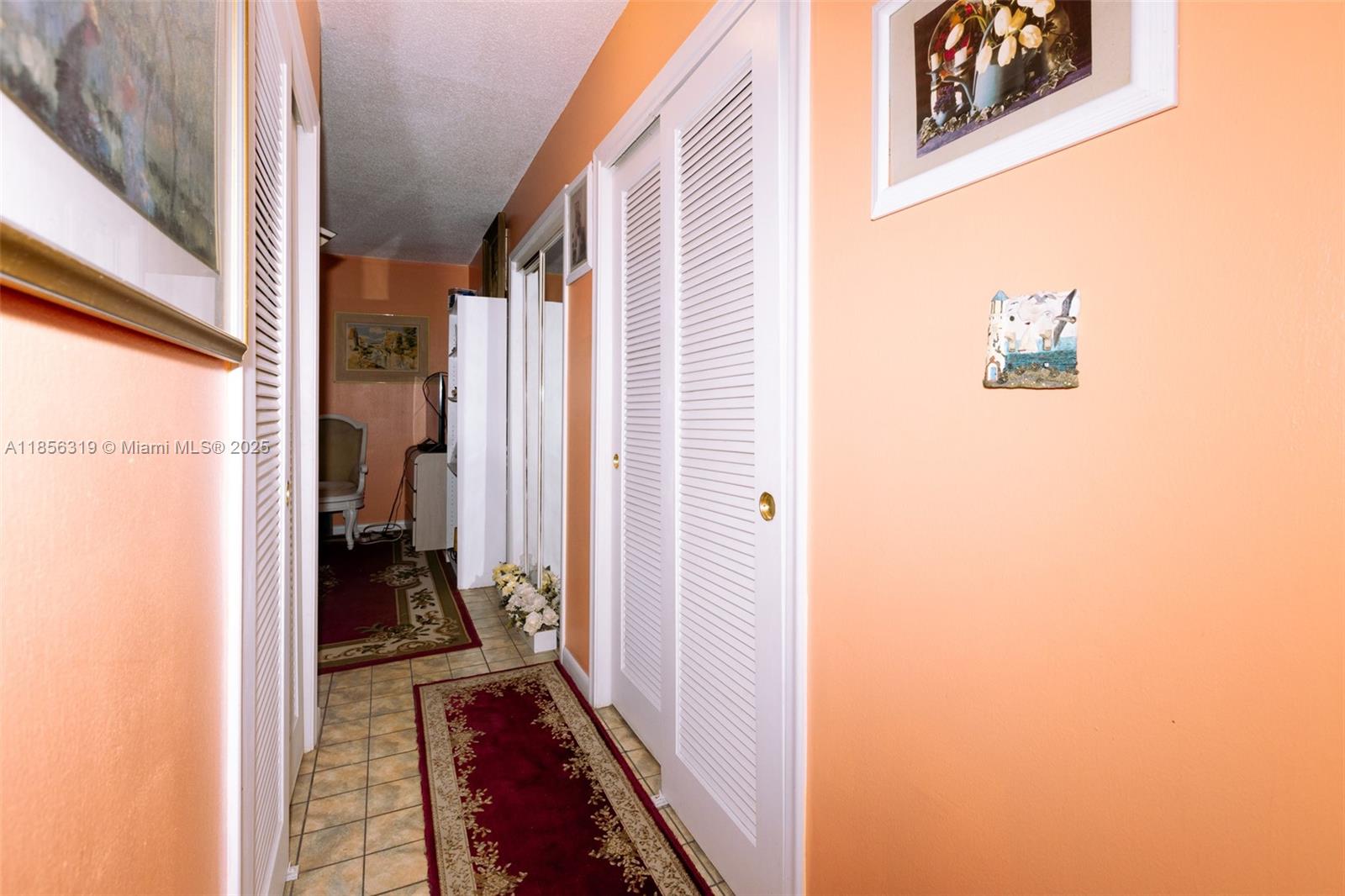 619 Northeast 14th Avenue, Unit 507 Hallandale Beach, FL 33009 - Photo 11 of 31 a view of a closet from a windows