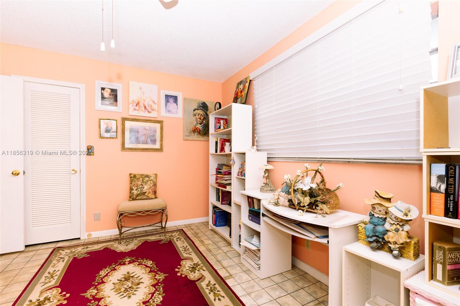 619 Northeast 14th Avenue, Unit 507 Hallandale Beach, FL 33009 - Photo 15 of 31 a living room with furniture and a rug