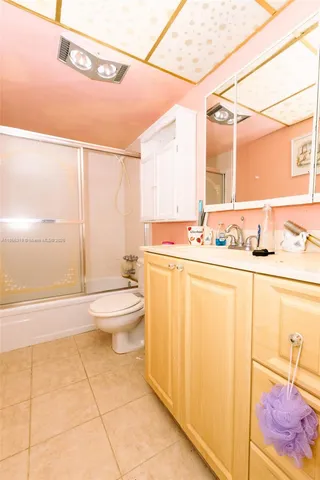 a bathroom with a bath tub