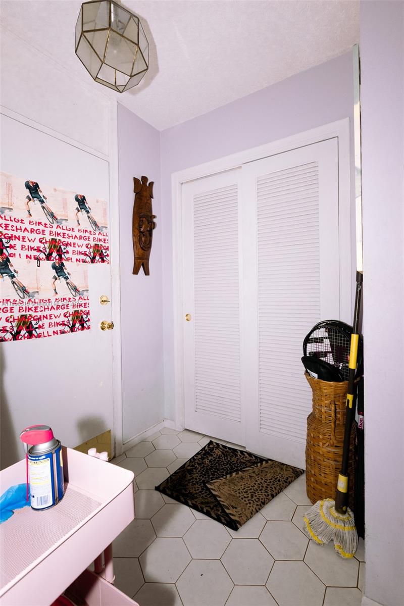 619 Northeast 14th Avenue, Unit 507 Hallandale Beach, FL 33009 - Photo 21 of 31 a room with toys and wooden floor