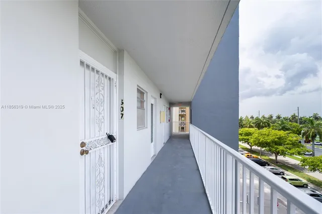 a view of a building with a street