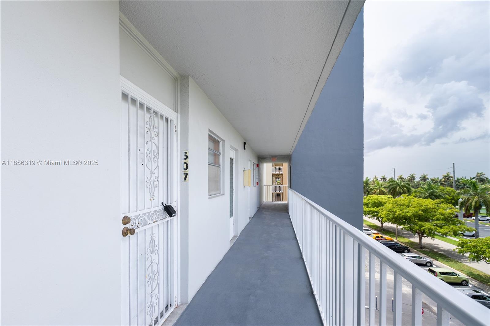 619 Northeast 14th Avenue, Unit 507 Hallandale Beach, FL 33009 - Photo 22 of 31 a view of a house with wooden floor and stairs