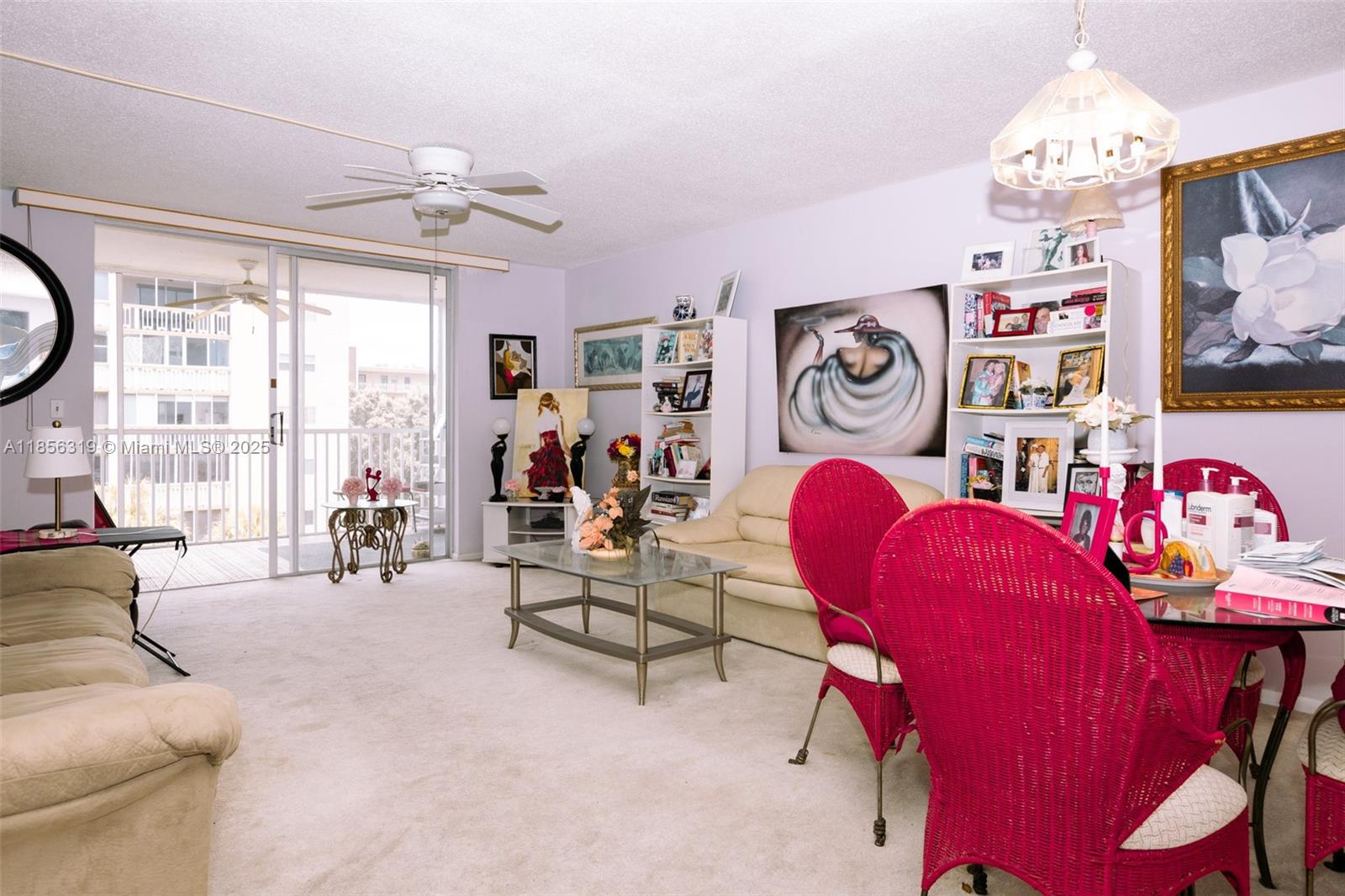 619 Northeast 14th Avenue, Unit 507 Hallandale Beach, FL 33009 - Photo 3 of 31 a living room with furniture and a large window