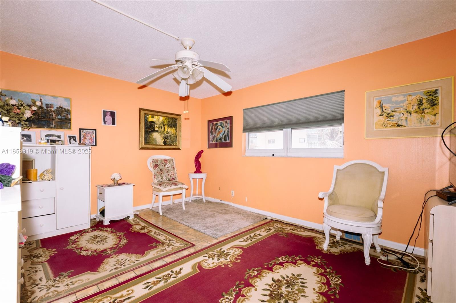 619 Northeast 14th Avenue, Unit 507 Hallandale Beach, FL 33009 - Photo 10 of 31 a living room with furniture and a window