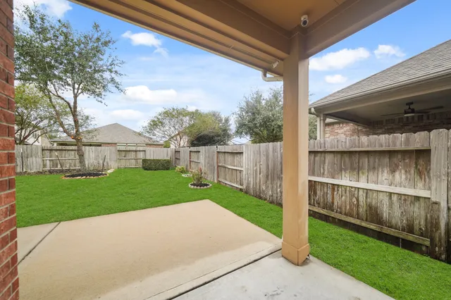 a view of backyard with green space