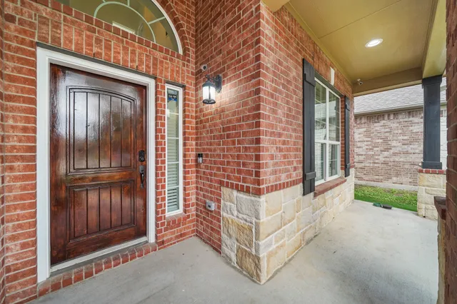 a view of front door with outdoor space