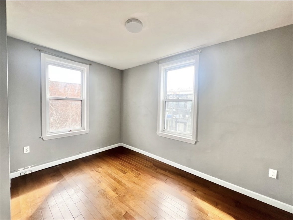 37 Maverick Street, Unit 3 Chelsea, MA 02150 - Photo 4 of 9 a view of an empty room with a window