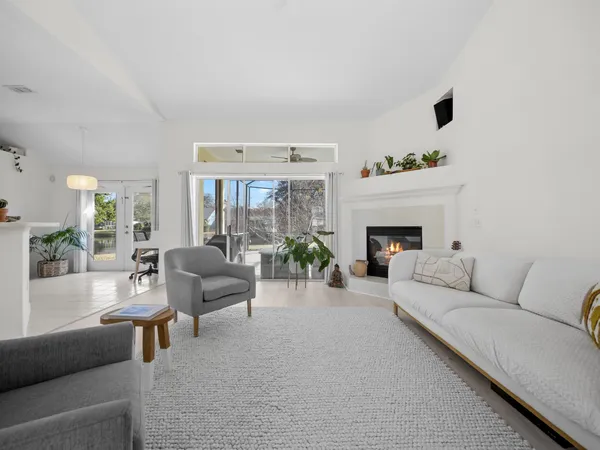 a view of a swimming pool with a porch