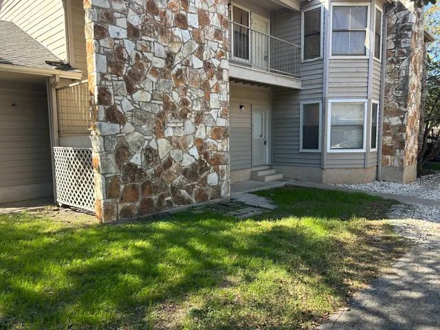 a view of a back yard of the house