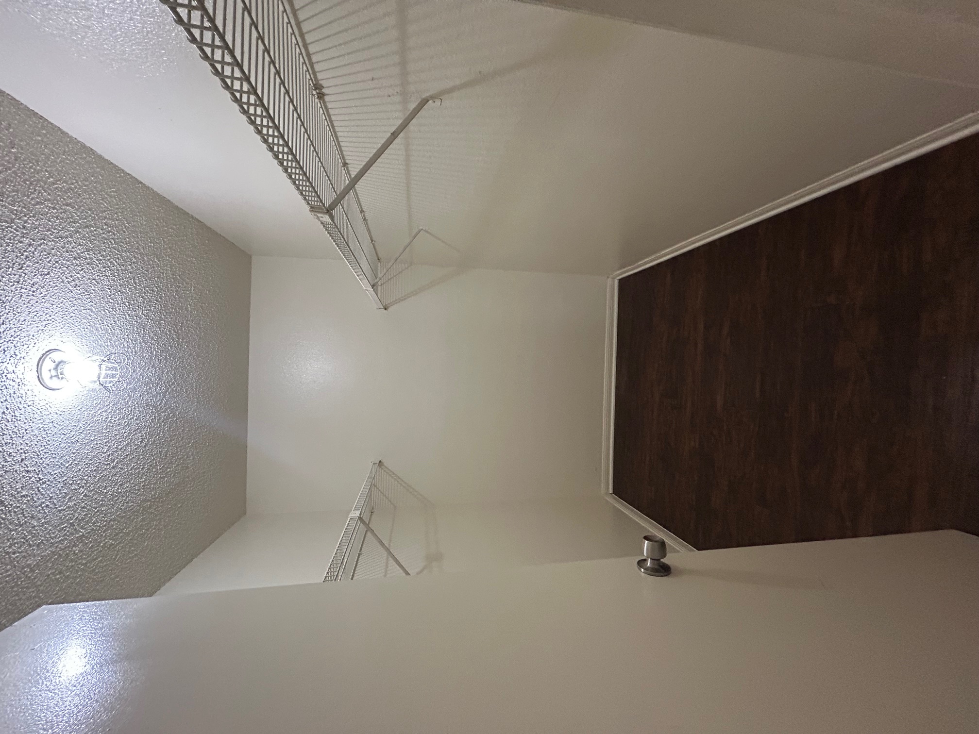 8812 Schick Road, Unit C Austin, TX 78729 - Photo 9 of 12 a view of a room with racks on the wall