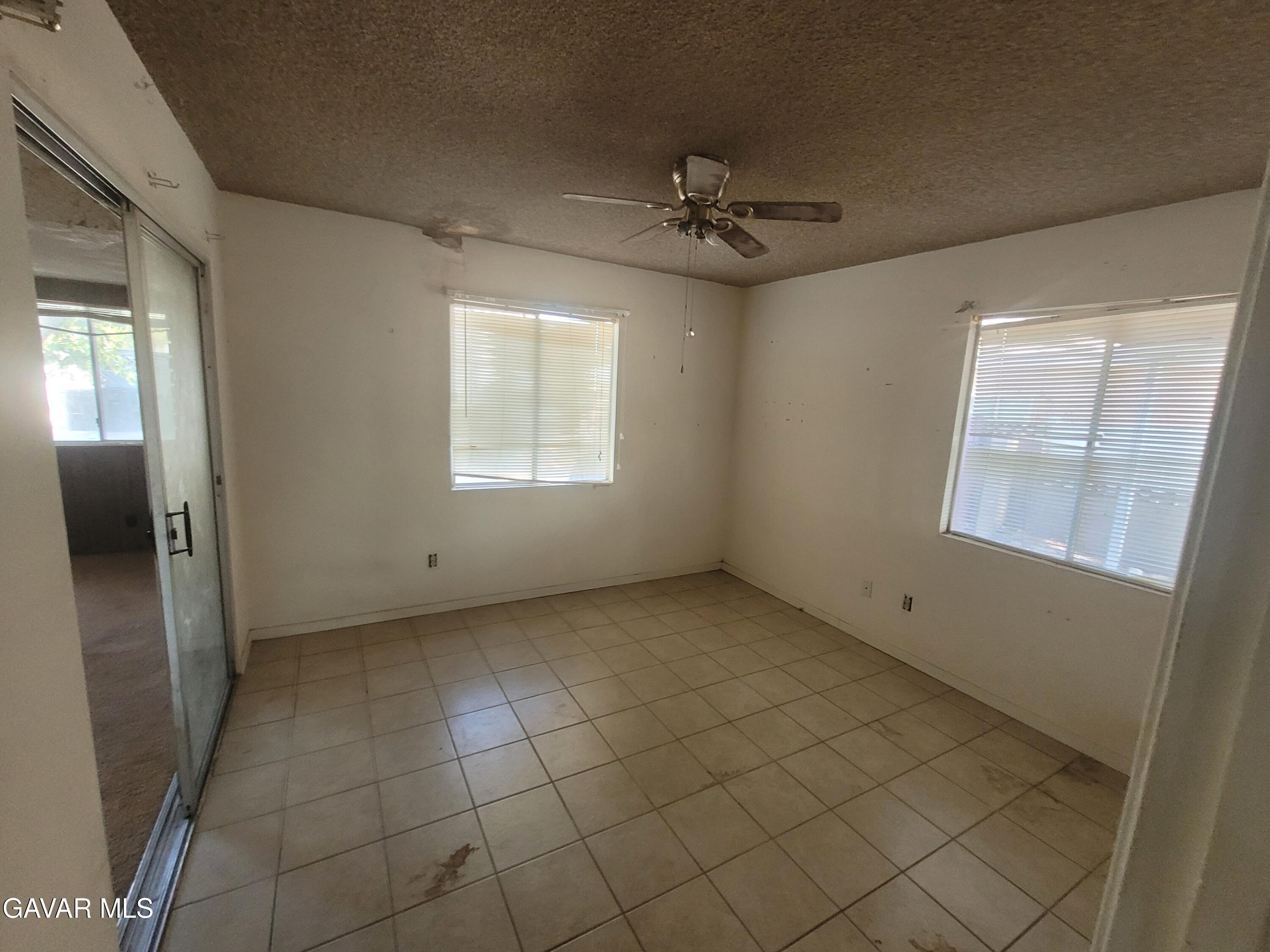 13420 Gilbert Street North Edwards, CA 93523 - Photo 14 of 20 a view of an empty room with a window