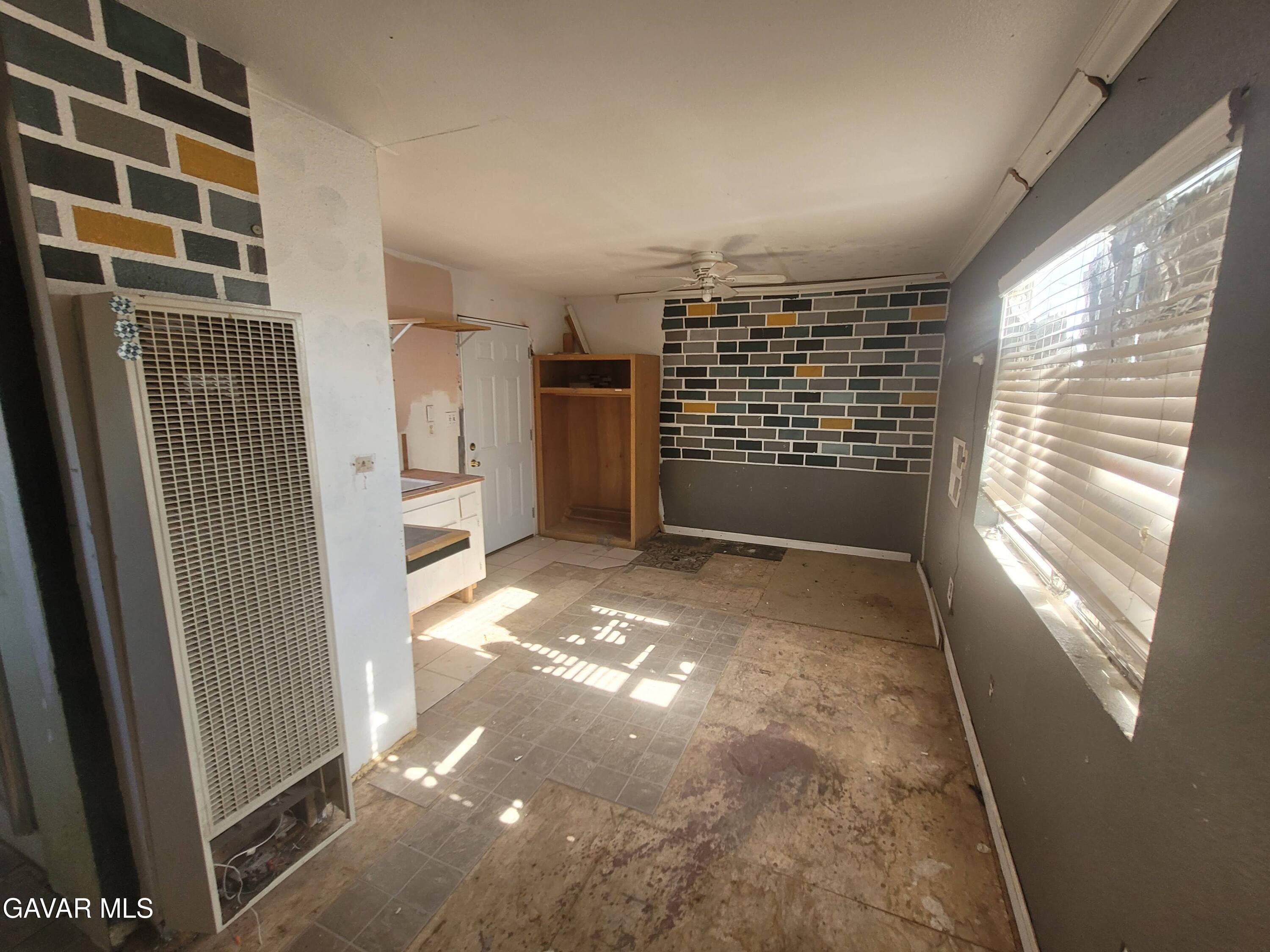 13420 Gilbert Street North Edwards, CA 93523 - Photo 19 of 20 a view of an empty room with a window