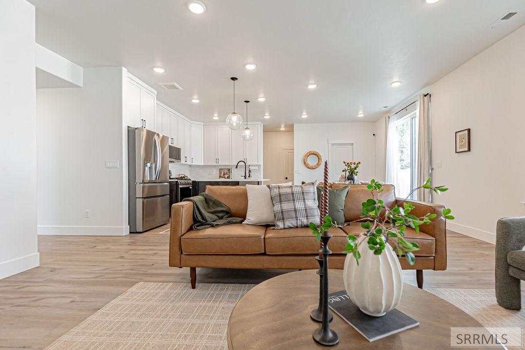 388 Church Street Ammon, ID 83401 - Photo 8 of 44 Living room into kitchen/dining