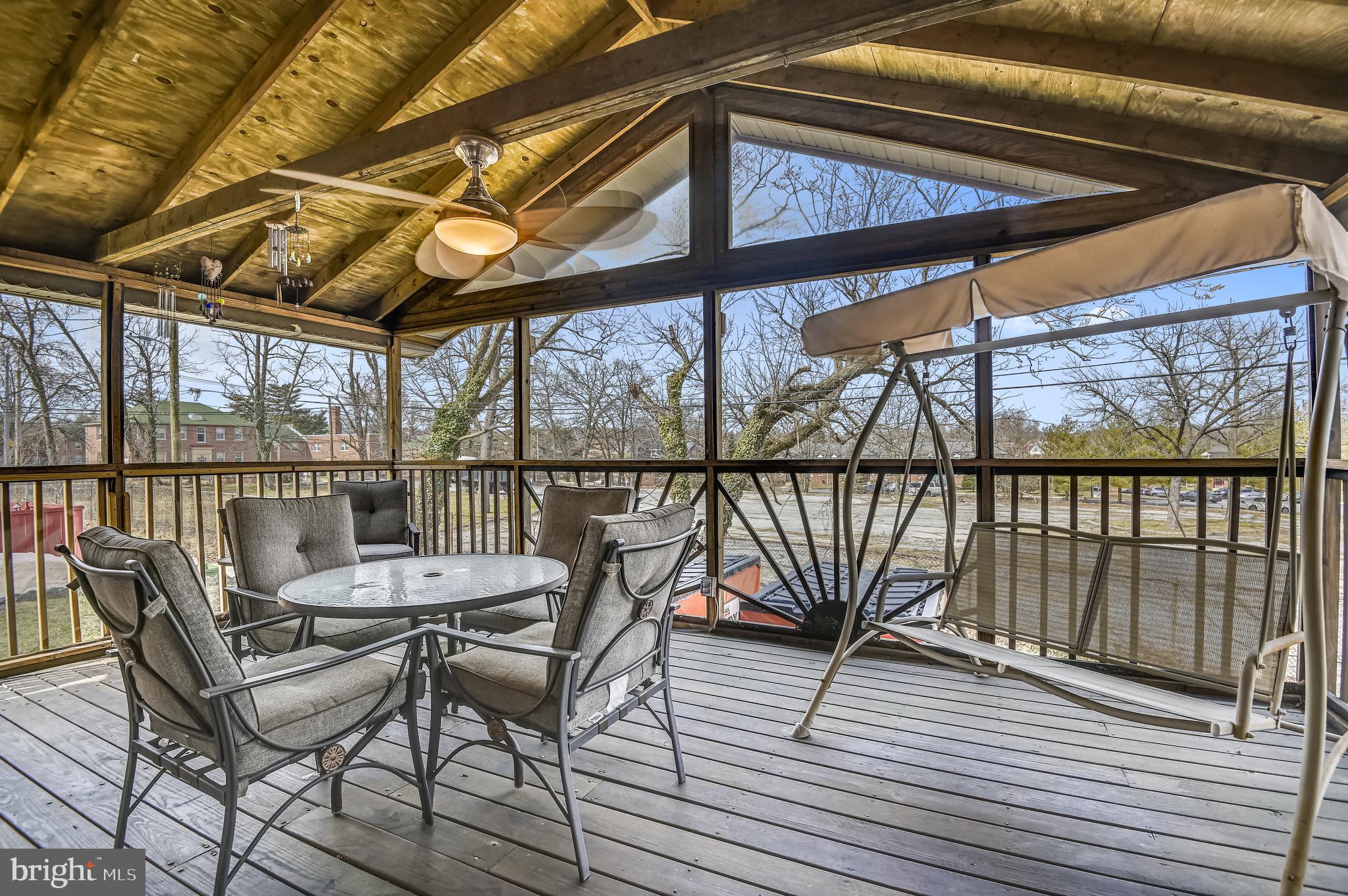 4816 Coleherne Road Baltimore, MD 21229 - Photo 17 of 44 Screened-in porch/deck.